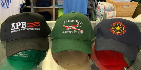 Close-up of a custom embroidered corporate hat stitched in-house by Island Silkscreen in Northport, Long Island.